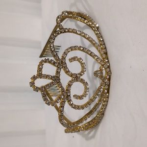 Gold tiara with rhinestones